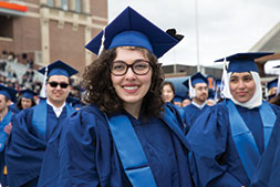 Photo of happy graduate. Link to Closely Held Business Stock