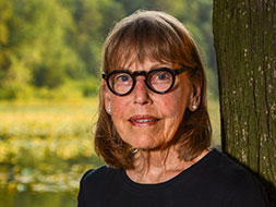 Photo of Dr. Jane Sherman (M.S. ’75). Link to her story